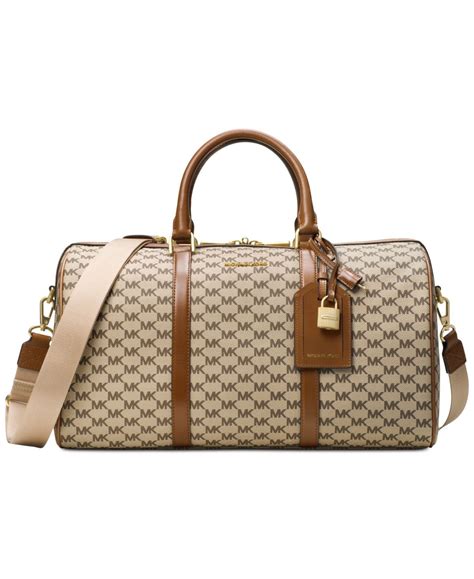 free michael kors duffle bag|Michael Kors trolley suitcase.